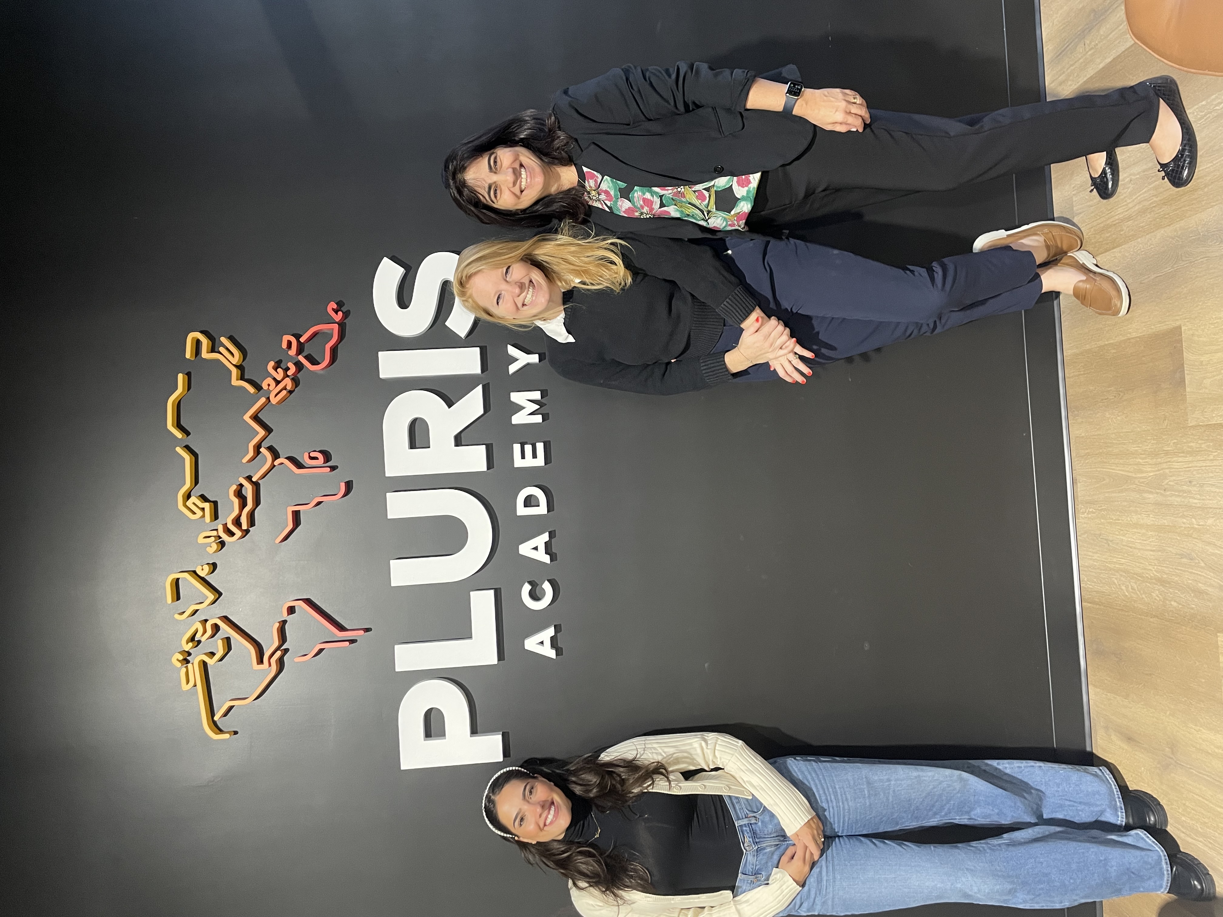 photo of students on playground and teacher reading to students 