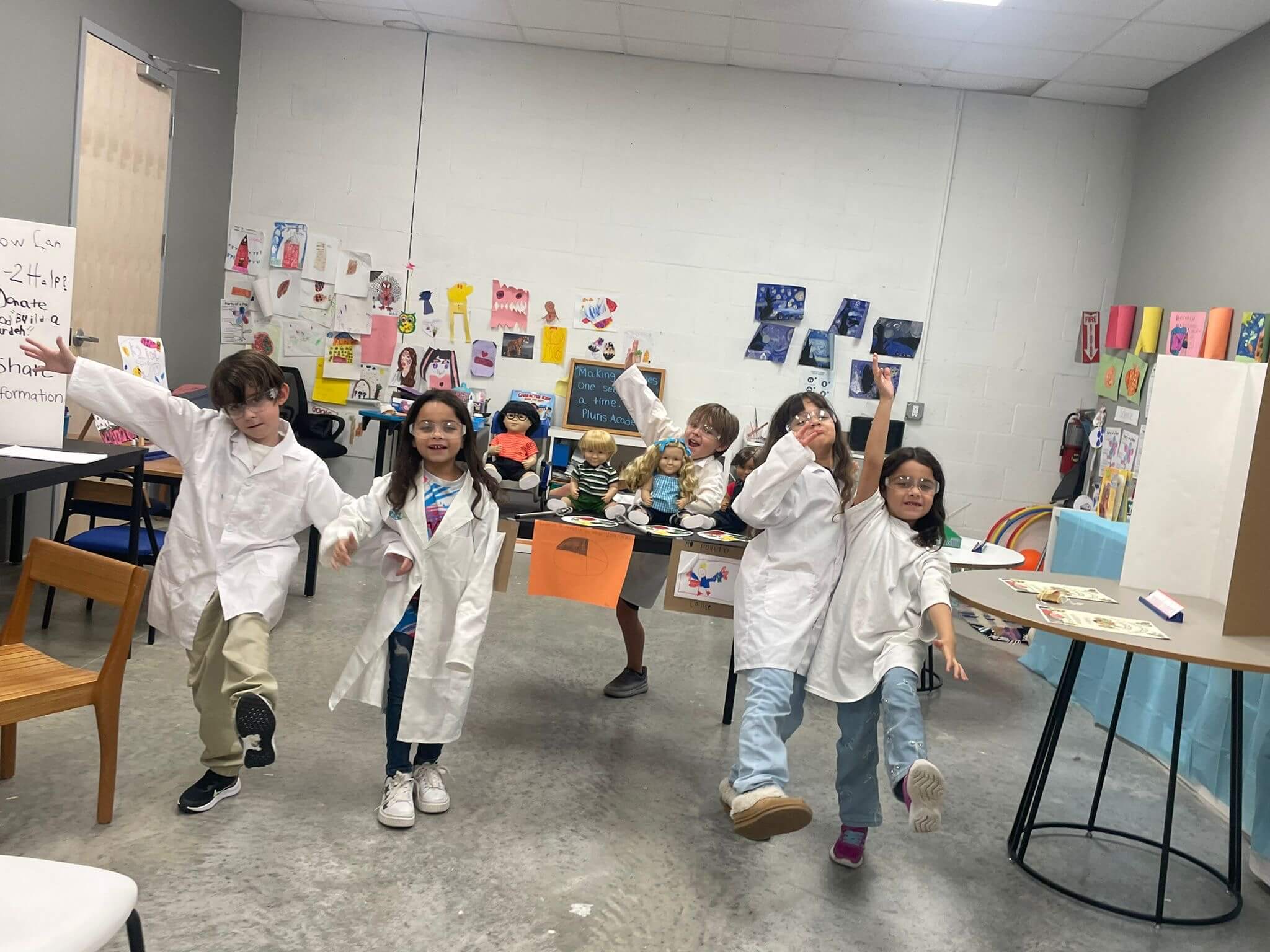 photo of students on playground and teacher reading to students 